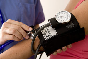 photo of a nurse taking a patient’s blood pressure | Atlanta Vascular & Vein Centers